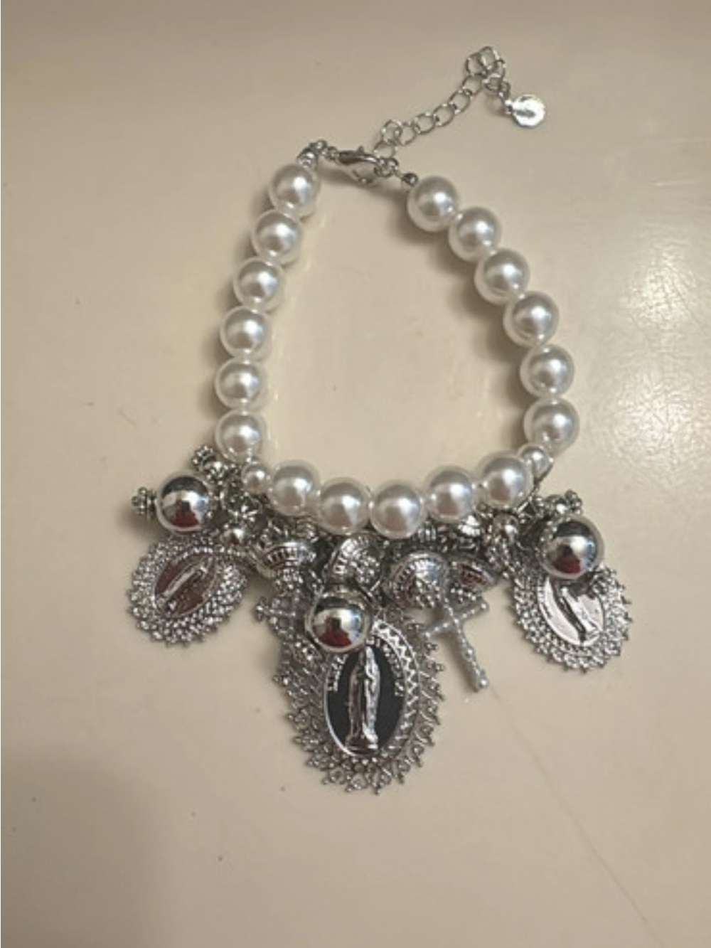 Pearl Charm Bracelet with Silver Religious Medallions
